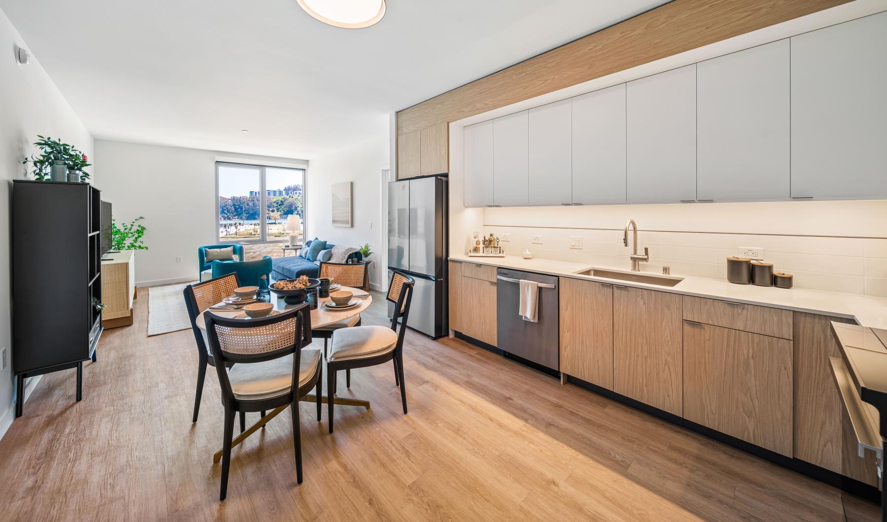 Settle into comfort at Hawkins a kitchen with a dining table