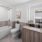 a bathroom with a tub toilet and sink