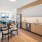 a kitchen with a dining table