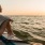 a woman sitting on a boat