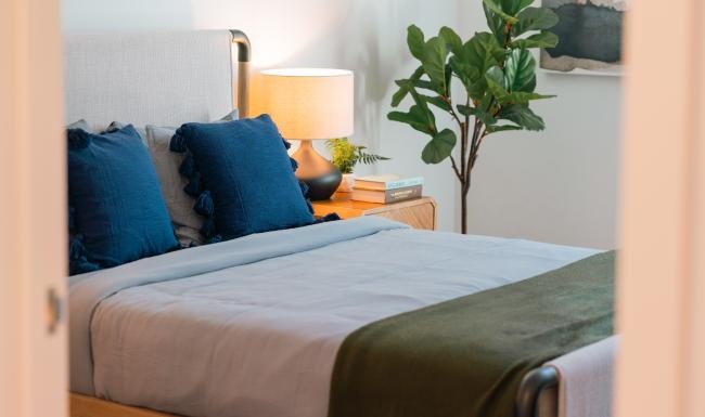 Sleep in style a bed with blue pillows