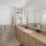 a bathroom with a large mirror