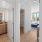 a room with a sink and a mirror